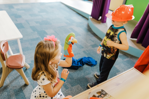 Children playing in front of the stage