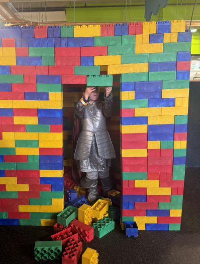 Child building with large blocks