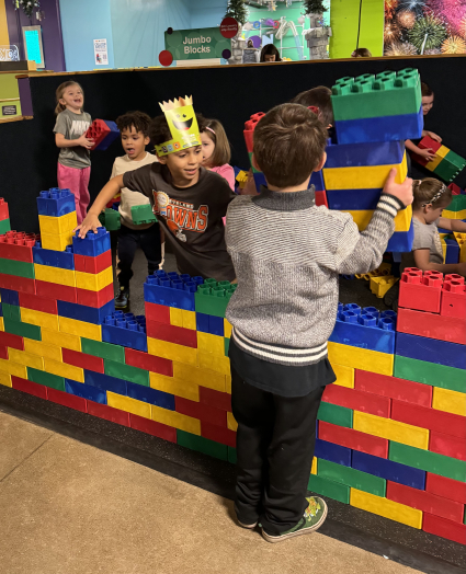 Children building with large blocks