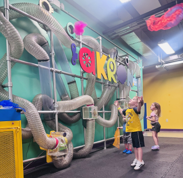 Children Playing with the Wind and Air Wall